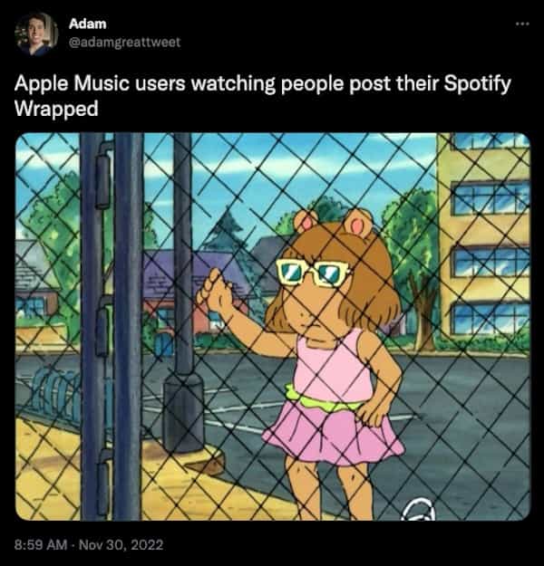 Apple Music users watching people post their Spotify Wrapped