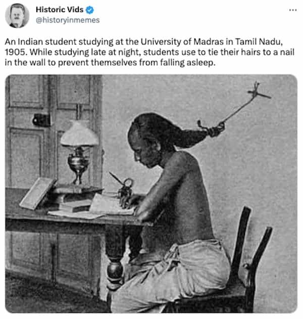 An Indian student studying at the University of Madras in Tamil Nadu, 1905. While studying late at night, students use to tie their hairs to a nail in the wall to prevent themselves from falling asleep.