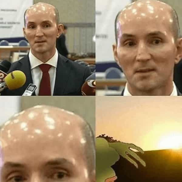 very shiny bald head guy