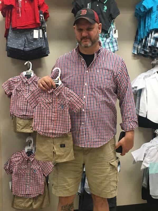 accidental camouflage man with baby clothes