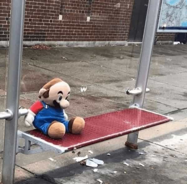 cursed images bald Mario bus stop