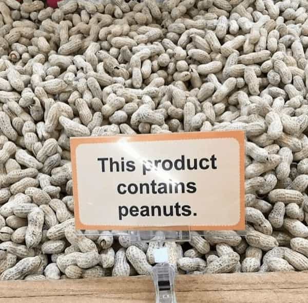 cursed images peanuts with contains peanut sign