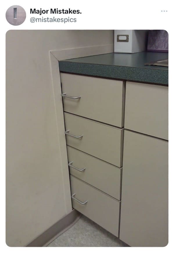 funny fails drawers half in wall.