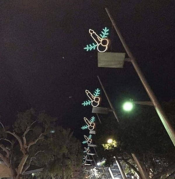 phallic Christmas decorations candles and mistletoe