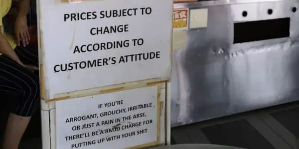 funny restaurant signs PRICES SUBJECT TO CHANGE ACCORDING TO CUSTOMER'S ATTITUDE IF YOU'RE ARROGANT, GROUCHY, IRRITABLE, OR JUST A PAIN IN THE ARSE, THERE'LL BEARMID CHARGE FOR PUTTING UP WITH YOUR