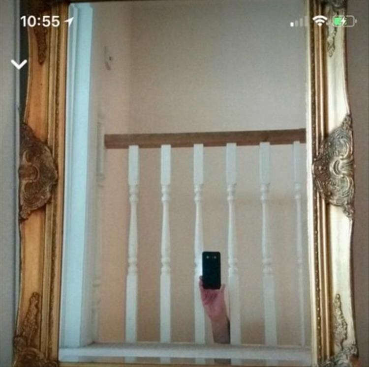 People trying to sell mirrors from from stairs