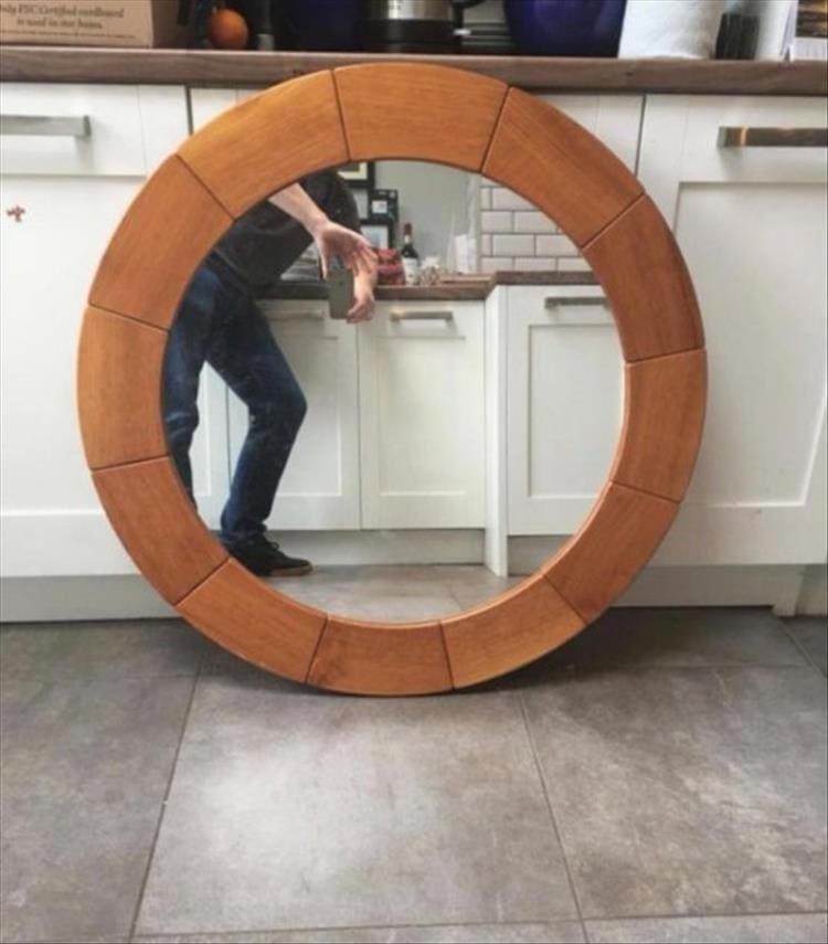 People trying to sell mirrors round mirror