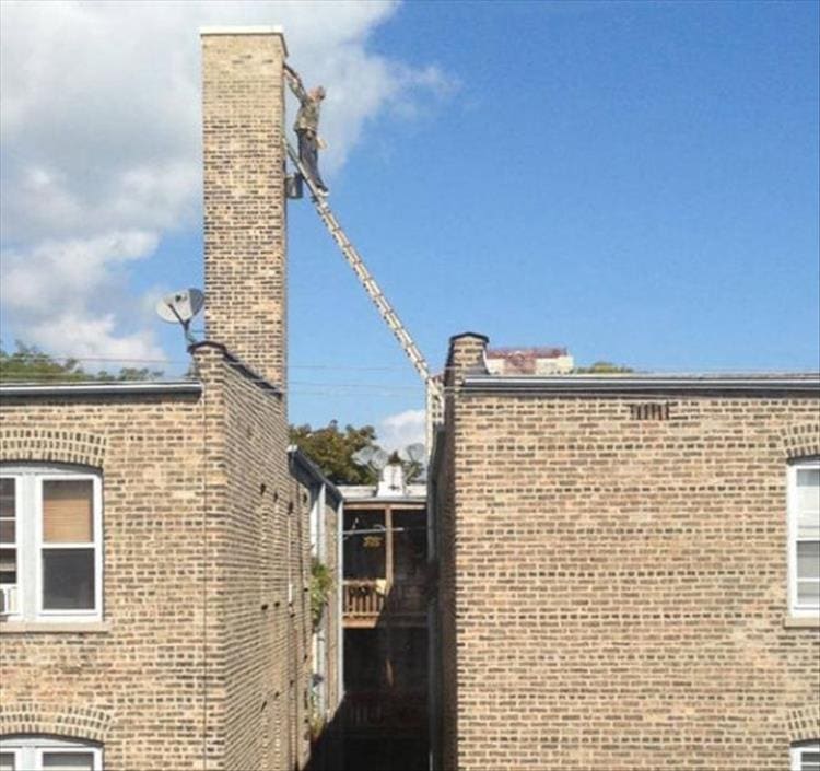 ladder to chimney across alley