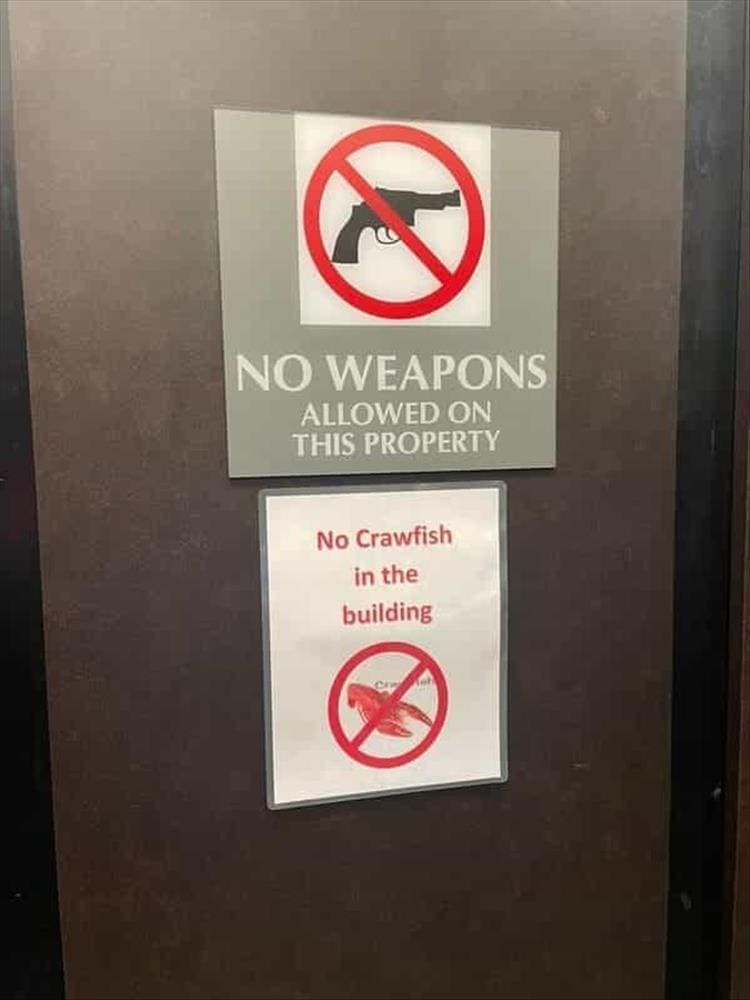 funny signs NO WEAPONS ALLOWED ON THIS PROPERTY No Crawfish in the building