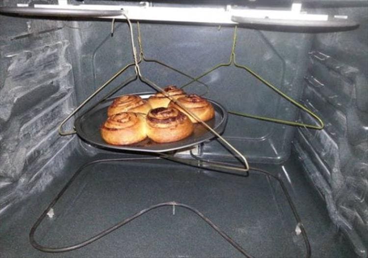 Redneck Engineering Cinnamon buns on hangers in oven