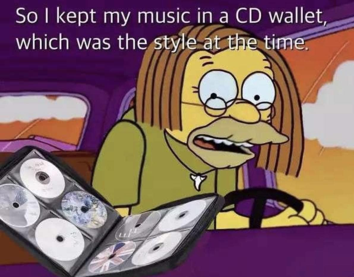 funny memes. So I kept my music in a CD wallet, which was the style at the time.