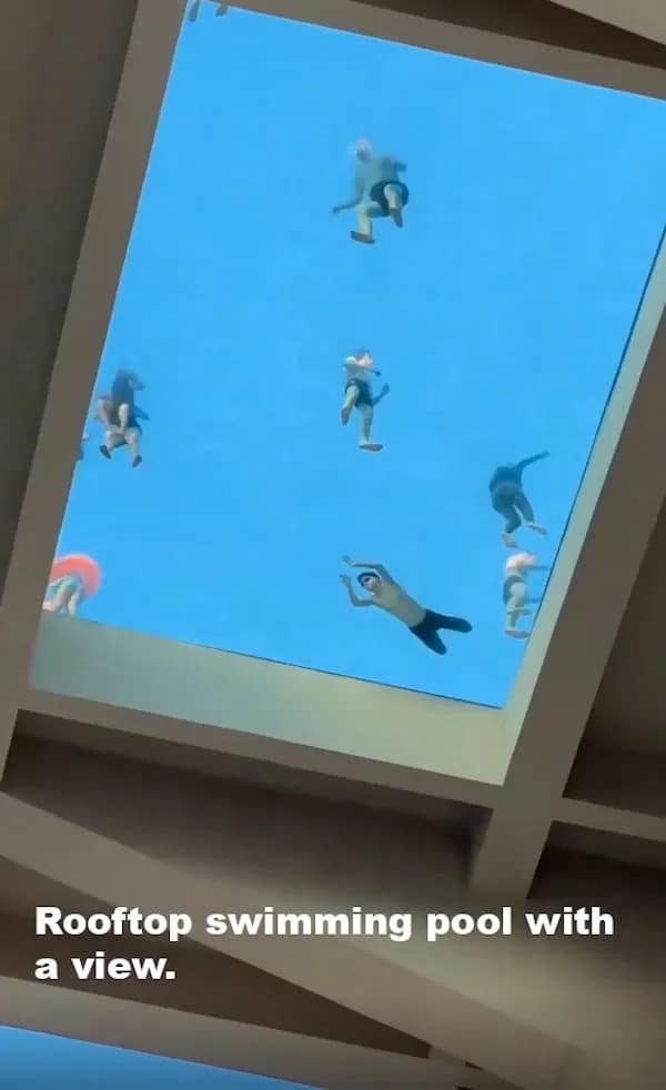 funny pics. Rooftop swimming pool with a view.