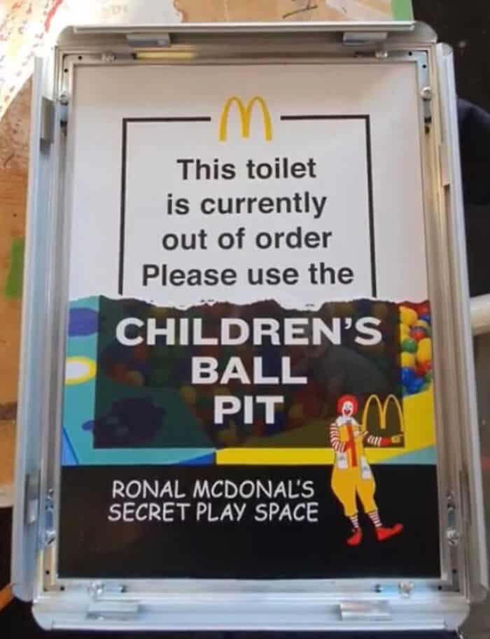 wholesome vandalism, positive graffiti, creative street art, uplifting vandalism, good vibes street art