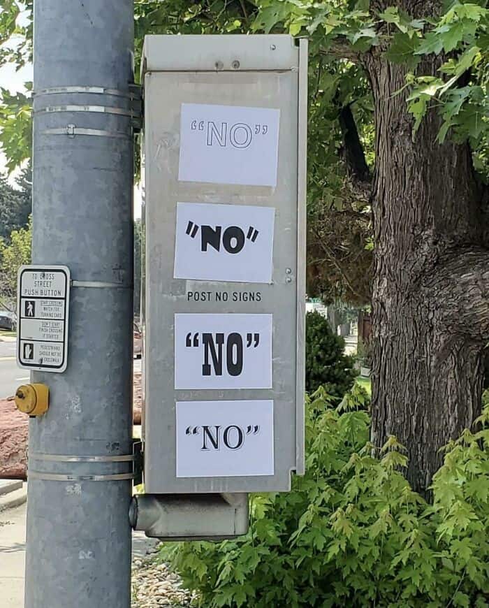 wholesome vandalism, positive graffiti, creative street art, uplifting vandalism, good vibes street art