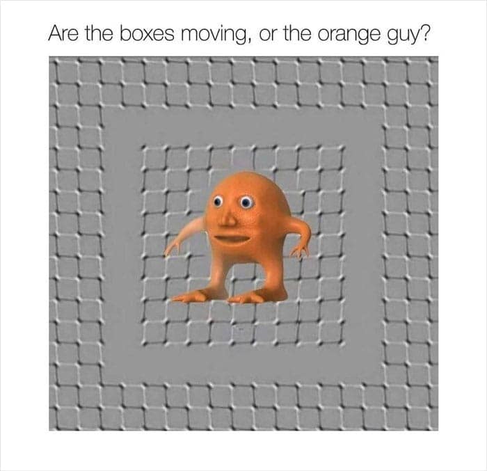 Are the boxes moving, or the orange guy?