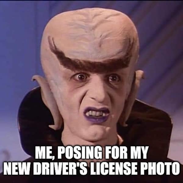 ME, POSING FOR MY NEW DRIVER'S LICENSE PHOTO
