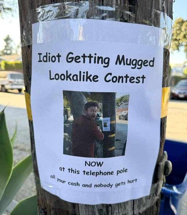 Idiot Getting Mugged Lookalike Contest NOW at this telephone pole a your cash and nobody gets hurt