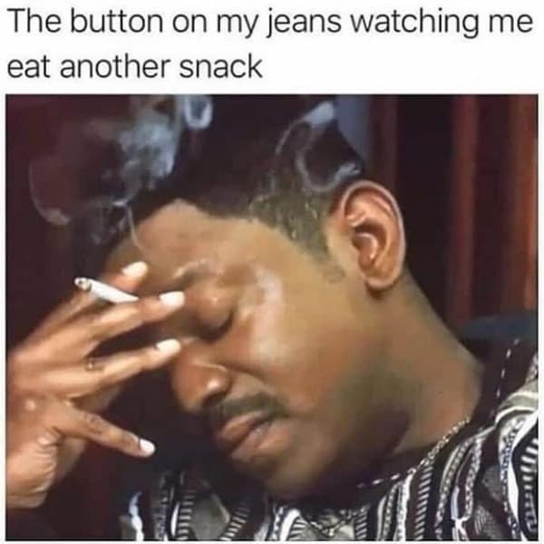 The button on my jeans watching me eat another snack