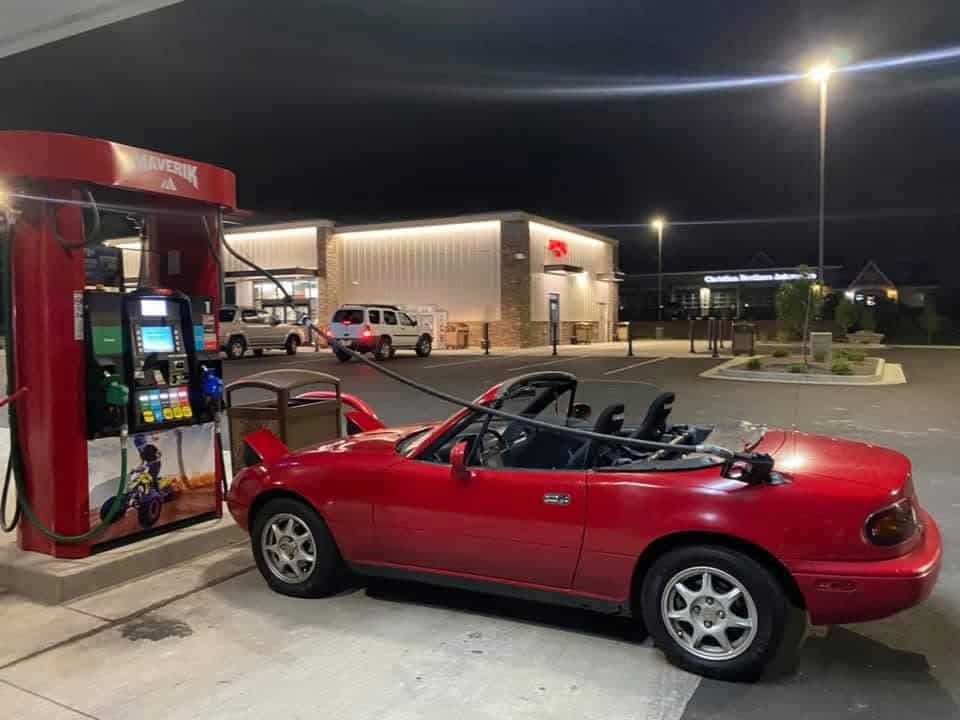 funny miata, miatas with threatening auras, comedic roadster bits, small convertible jokes, quirky sports car humor, Miata memes, comedic two-seater illusions, beloved tiny ride references, Mazda jokes, brand-based comedic angles, automaker witty bits, car humor, vehicular comedic lines, automotive meltdown commentary