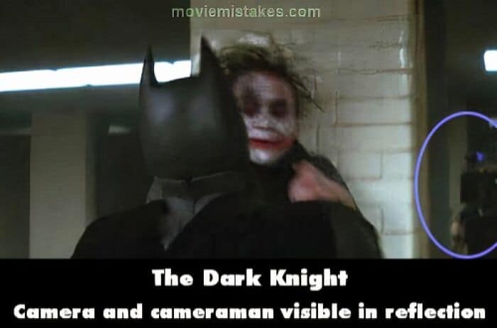 The Dark Knight Camera and cameraman visible in reflection