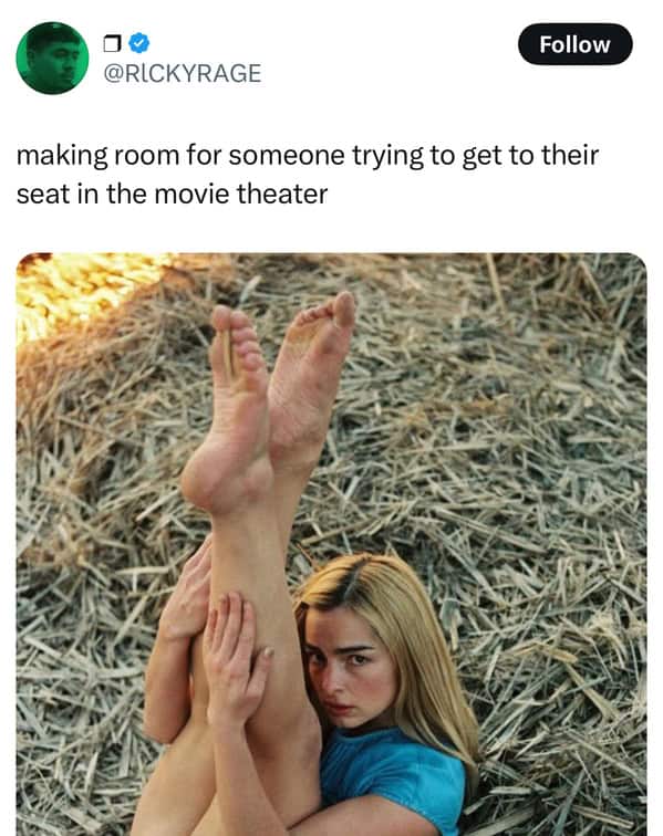 making room for someone trying to get to their seat in the movie theater