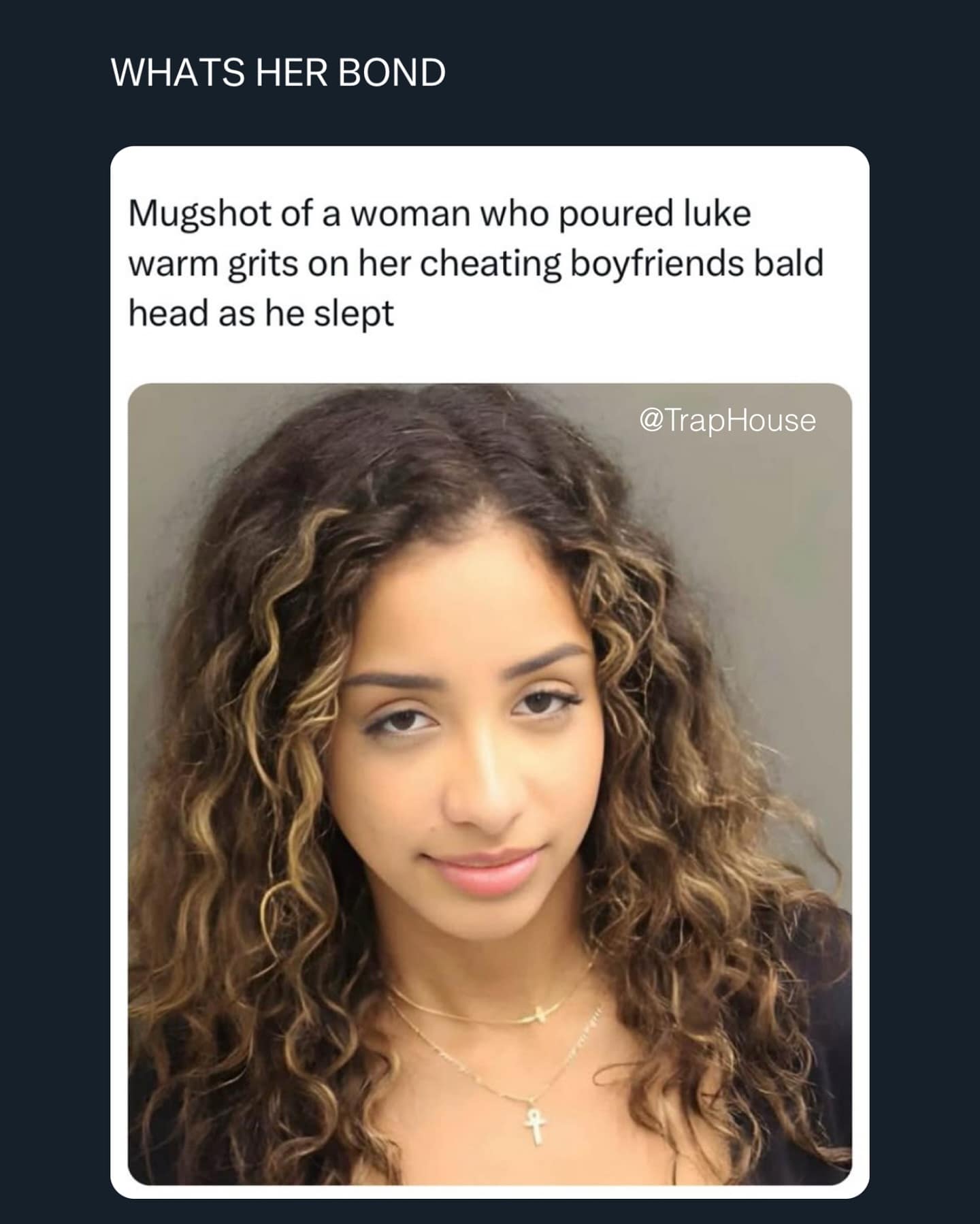 Mugshot of a woman who poured luke warm grits on her cheating boyfriends bald head as he slept