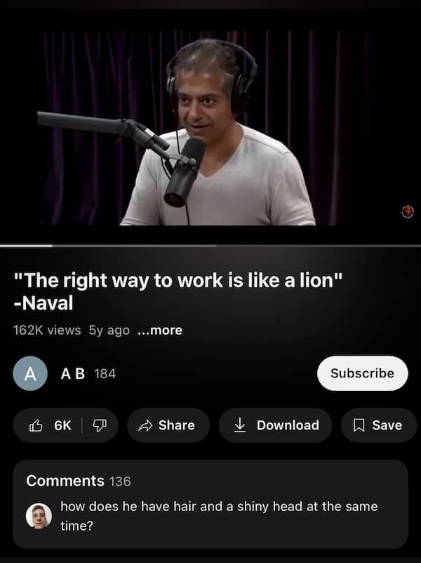 how does he have hair and a shiny head at the same