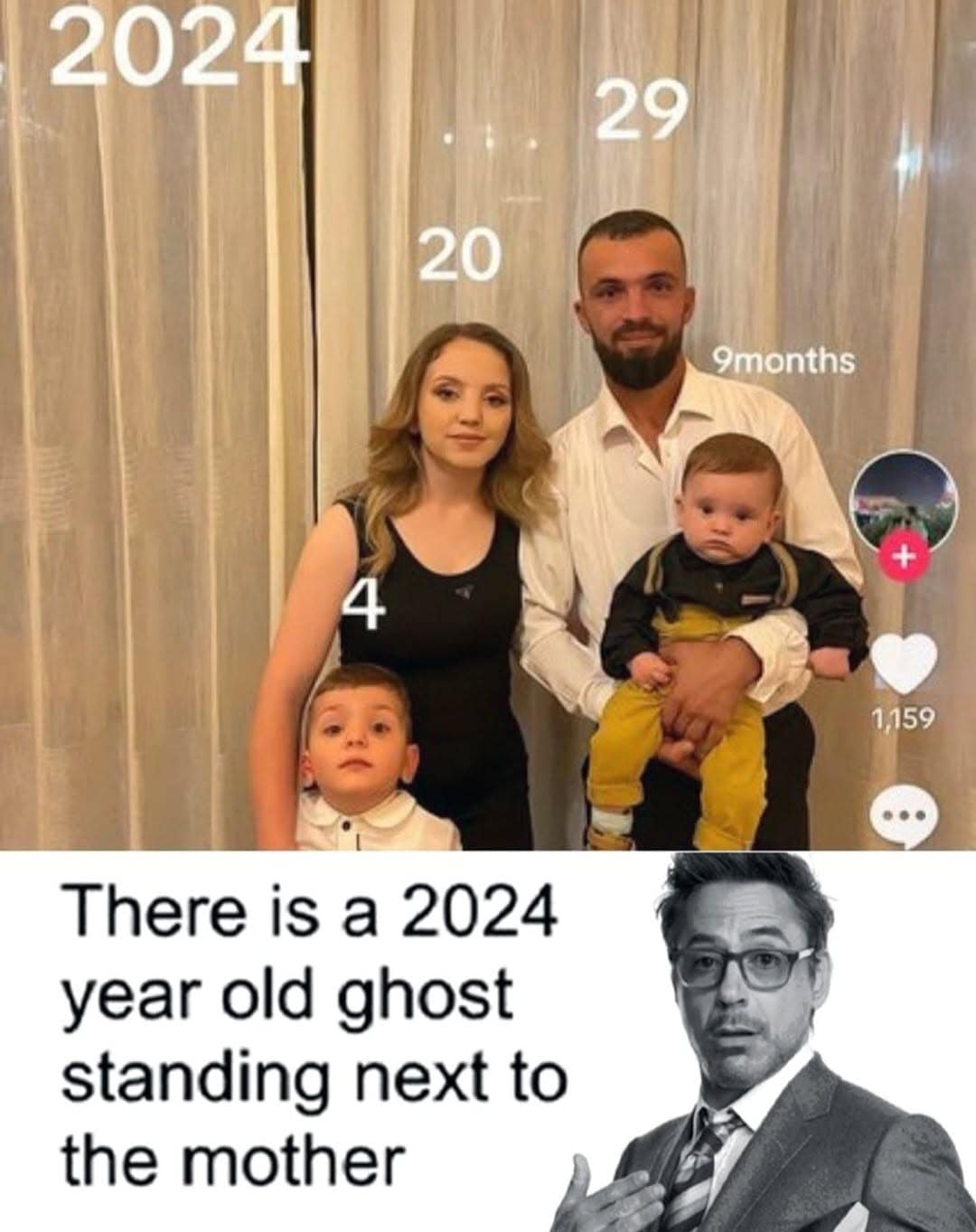 There is a 2024 year old ghost standing next to the mother