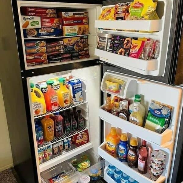 bachelor fridges, dude fridges, dude fridge pics, single guy fridges, minimal fridge setups, male fridge humor, bro kitchen fun, comedic food storage, minimalistic groceries, empty fridge habits, stark snack choices, fridge arrangement ideas, refrigerator fails, leftover mania