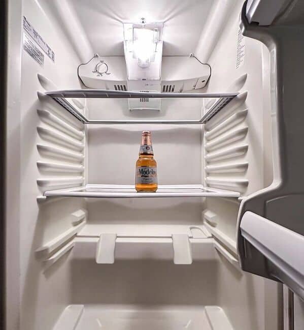 bachelor fridges, dude fridges, dude fridge pics, single guy fridges, minimal fridge setups, male fridge humor, bro kitchen fun, comedic food storage, minimalistic groceries, empty fridge habits, stark snack choices, fridge arrangement ideas, refrigerator fails, leftover mania