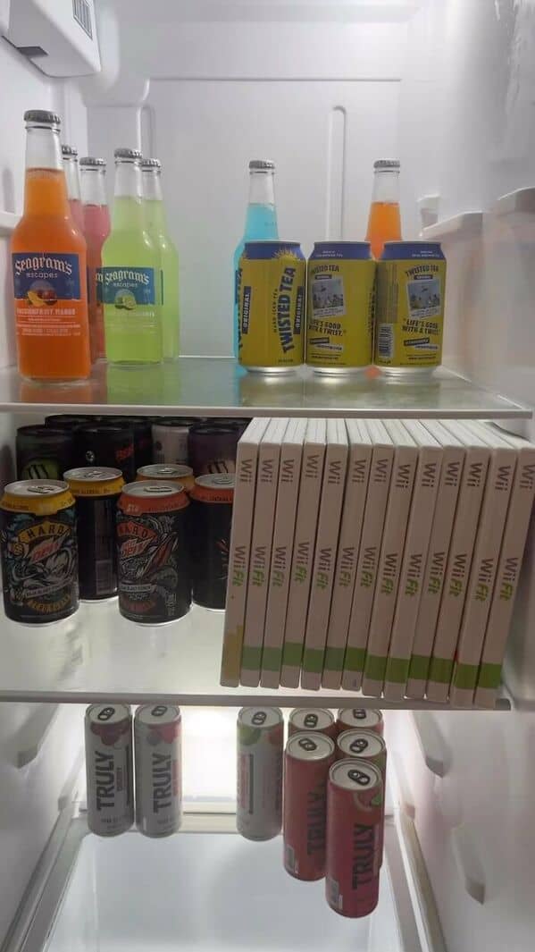 bachelor fridges, dude fridges, dude fridge pics, single guy fridges, minimal fridge setups, male fridge humor, bro kitchen fun, comedic food storage, minimalistic groceries, empty fridge habits, stark snack choices, fridge arrangement ideas, refrigerator fails, leftover mania