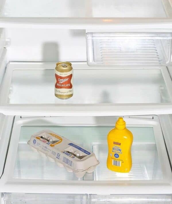 bachelor fridges, dude fridges, dude fridge pics, single guy fridges, minimal fridge setups, male fridge humor, bro kitchen fun, comedic food storage, minimalistic groceries, empty fridge habits, stark snack choices, fridge arrangement ideas, refrigerator fails, leftover mania