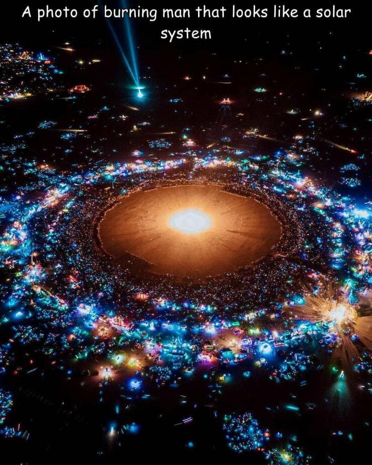 A photo of burning man that looks like a solar system