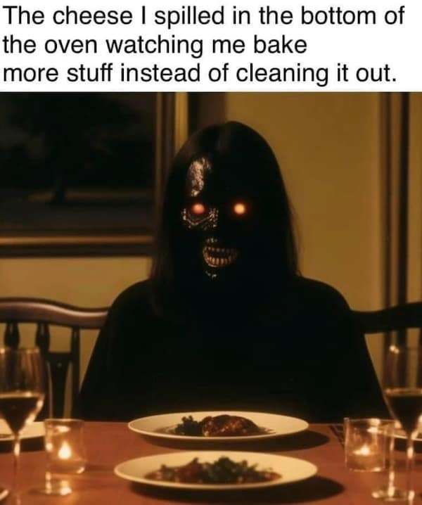 The cheese I spilled in the bottom of the oven watching me bake more stuff instead of cleaning it out.