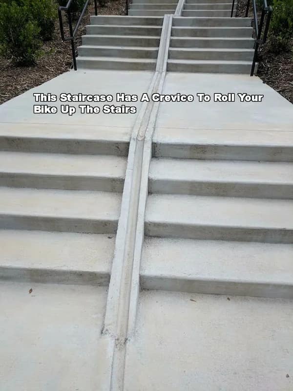 This Stalrcase Has A Crevice To Roll Your Bike Up The Stalrs