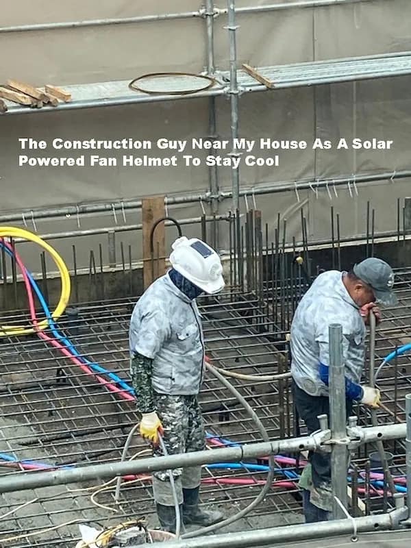 The Construction Guy Near My House As A Solar Powered Fan Helmet To Stay Cool