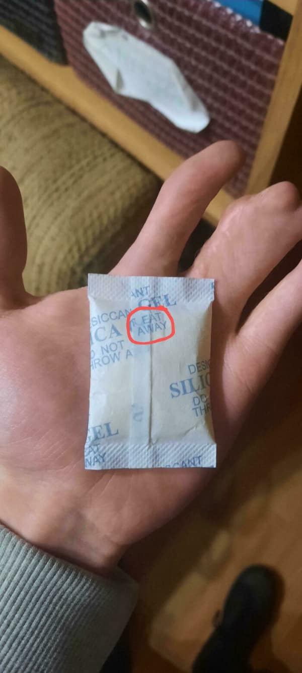 Silica gel packet with text circled to read “EAT” instead of “DO NOT EAT”