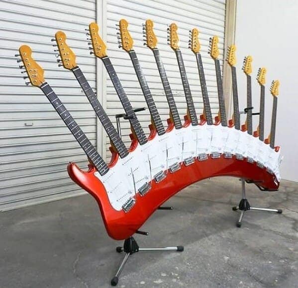 cursed instruments, instruments with threatening auras, weird instruments, instrument fails, bizarre music, odd instruments, performance art, music gadgets, funny instrument photos, experimental music, custom instruments, music humor, instrument design, odd musical gear, creepy instruments