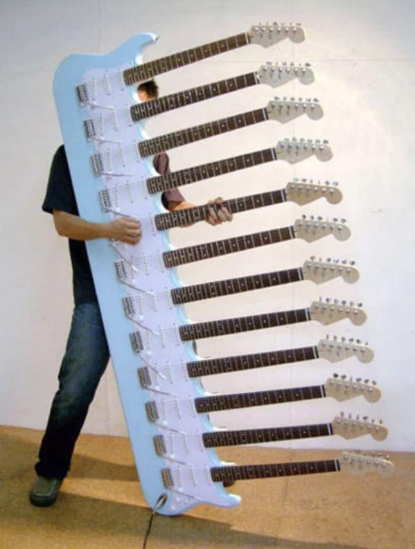 cursed instruments, instruments with threatening auras, weird instruments, instrument fails, bizarre music, odd instruments, performance art, music gadgets, funny instrument photos, experimental music, custom instruments, music humor, instrument design, odd musical gear, creepy instruments