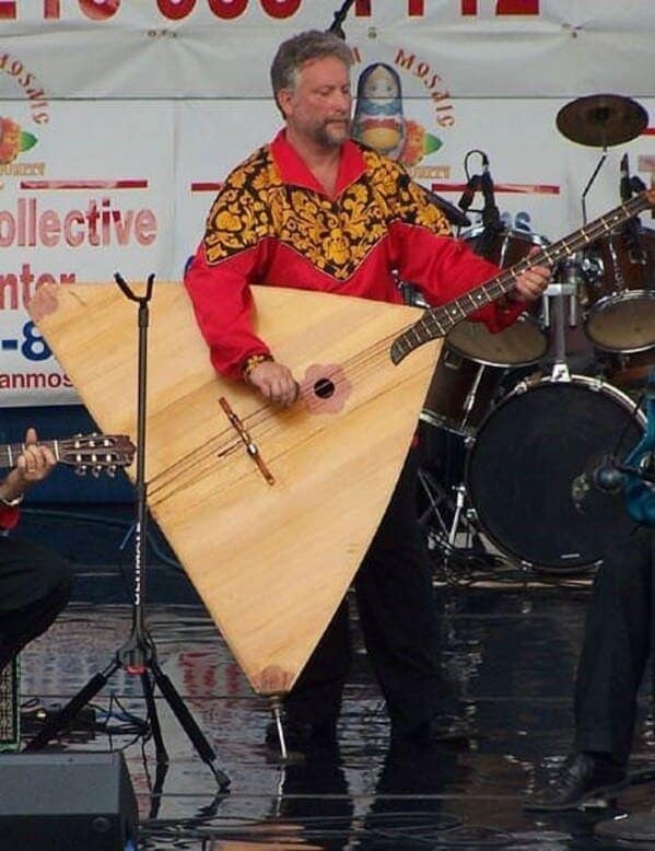 cursed instruments, instruments with threatening auras, weird instruments, instrument fails, bizarre music, odd instruments, performance art, music gadgets, funny instrument photos, experimental music, custom instruments, music humor, instrument design, odd musical gear, creepy instruments