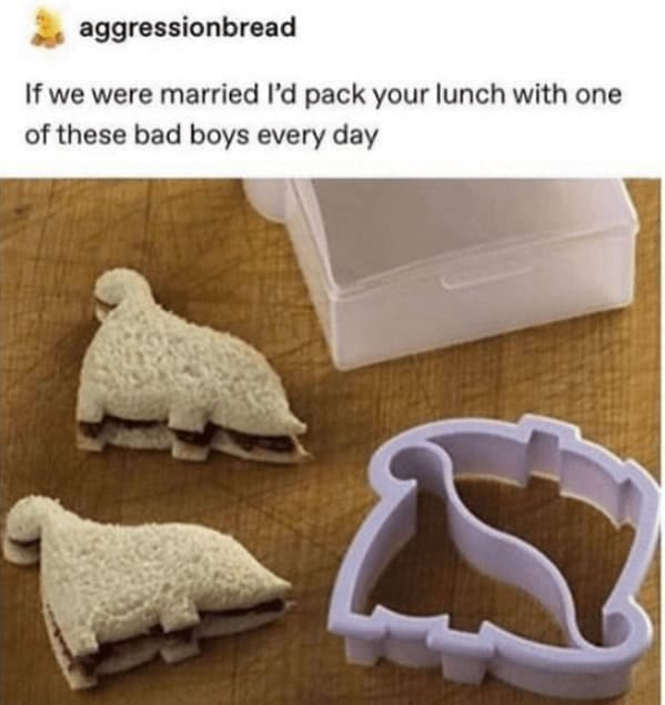 Sandwich cut into dinosaur shapes with a plastic sandwich cutter.