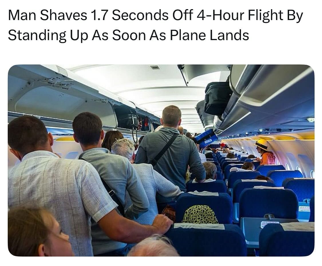 Man Shaves 1.7 Seconds Off 4-Hour Flight By Standing Up As Soon As Plane Lands