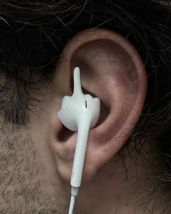 Earbud shaped like a middle finger gesture