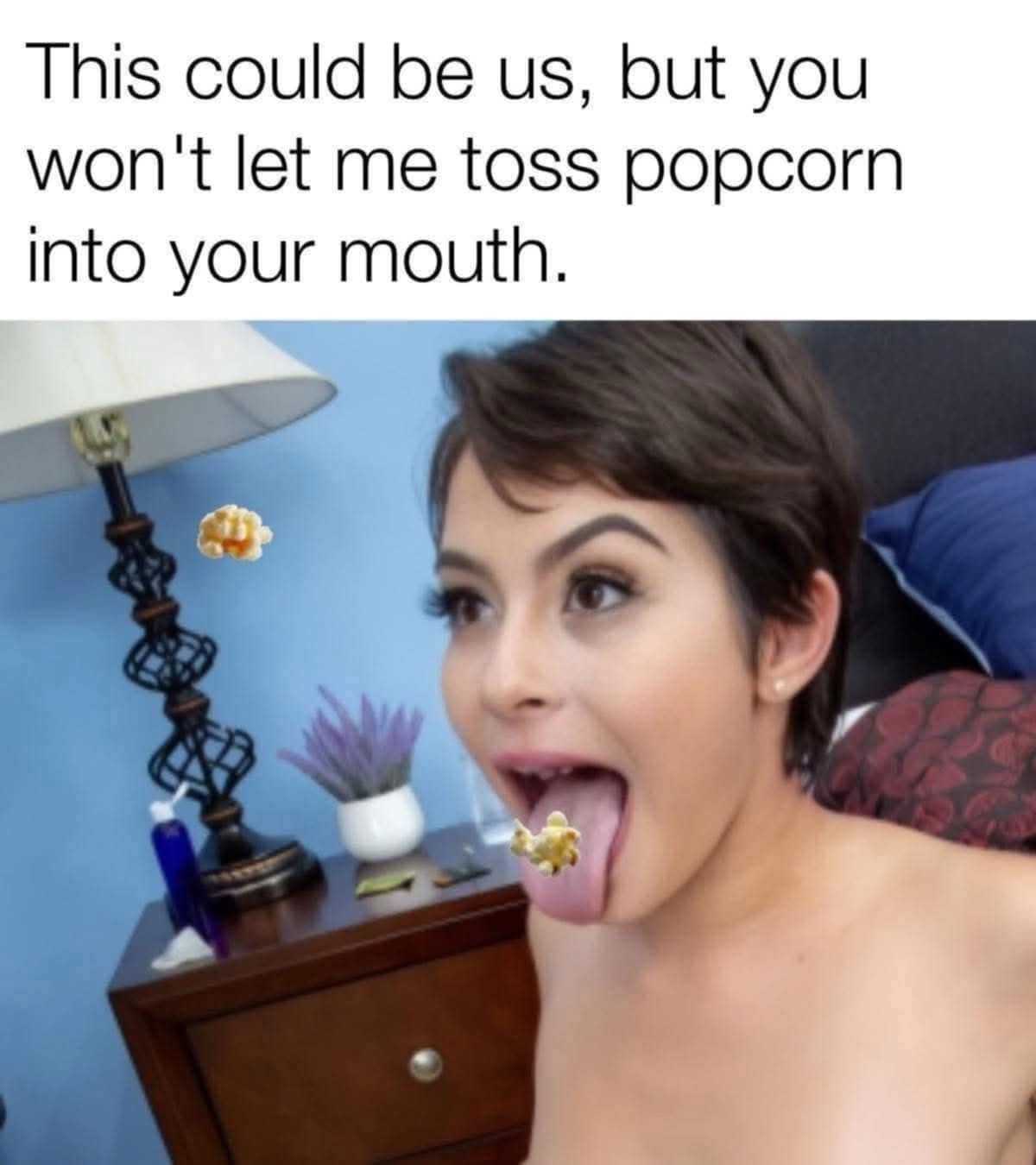 Woman catching popcorn in mouth with caption about couple goals