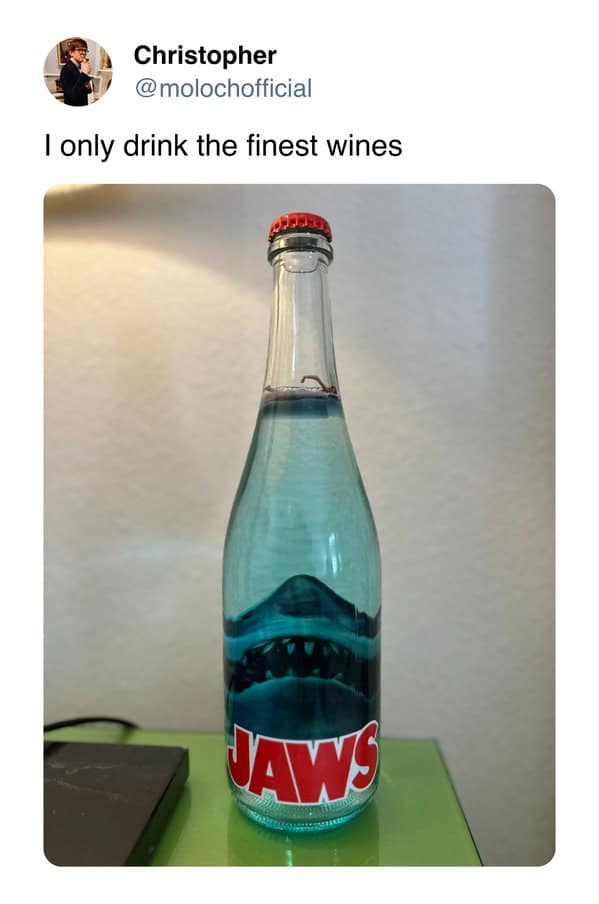Bottle of Jaws-themed water pretending to be fine wine