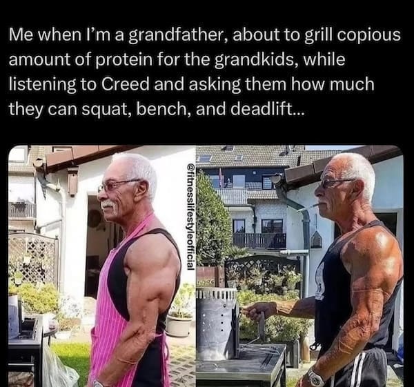 Man in street clothes lifting heavy barbell in crowded commercial gym