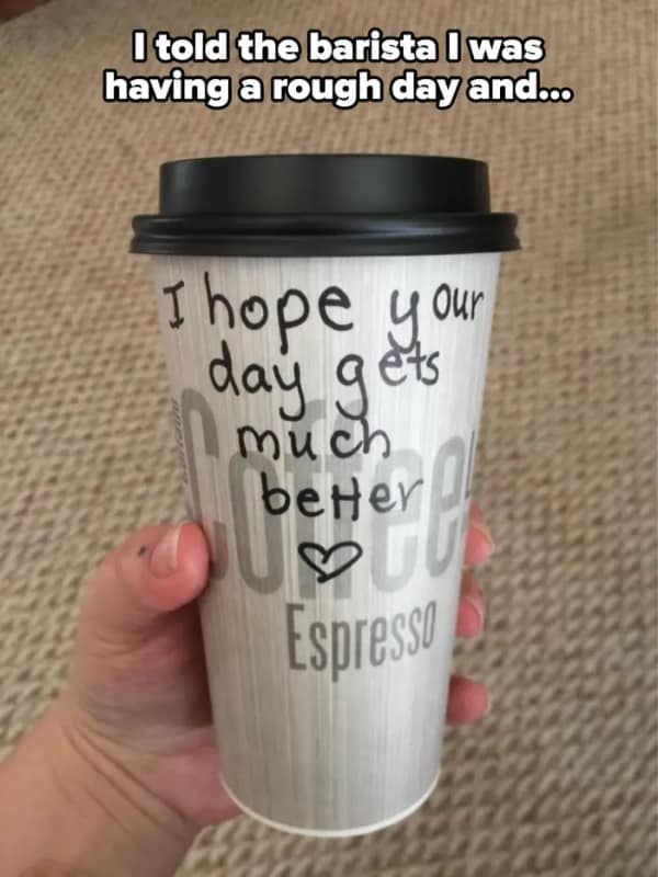 Coffee cup with handwritten message from kind barista