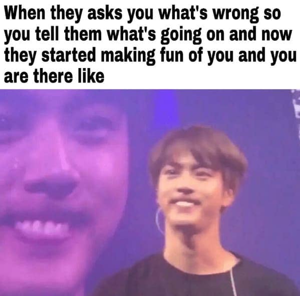 BTS member Jin smiling while being mocked after opening up about feelings