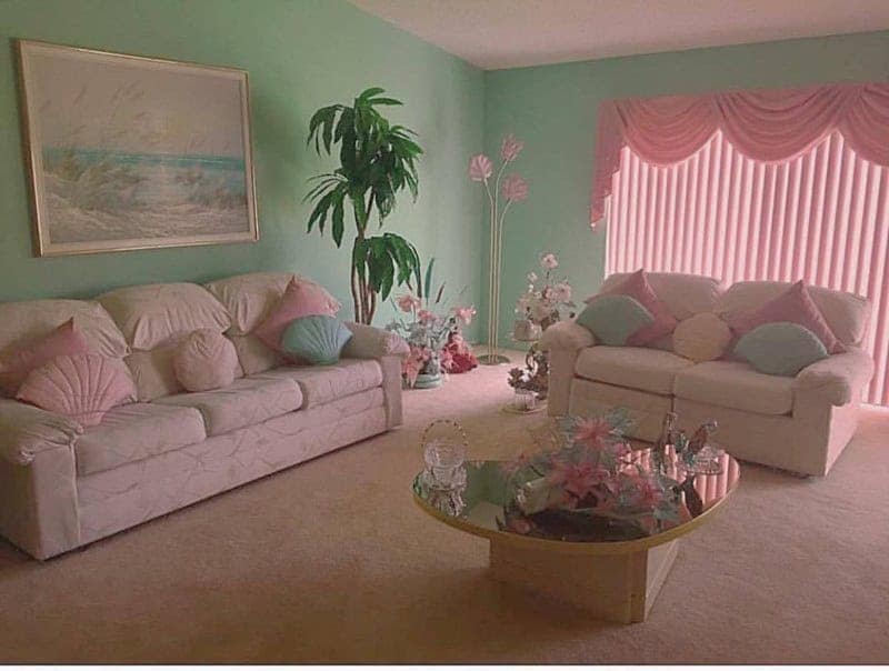 1980s pastel living room with mint green walls and pink decor