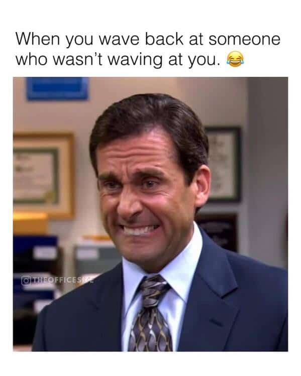 Michael Scott grimacing after waving at someone who wasn’t waving at him